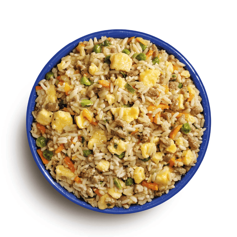 Load image into Gallery viewer, Bowl of fried rice with vegetables and meat on a white background