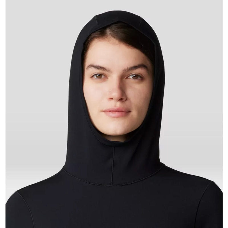 Load image into Gallery viewer, Person wearing a black hooded garment against a light gray background