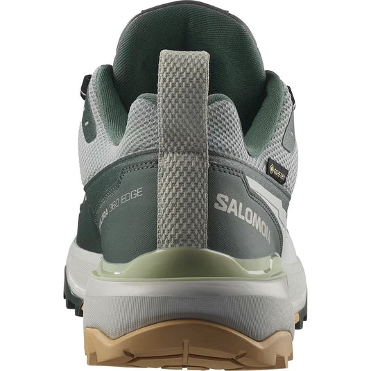 Back view of a Salomon hiking shoe on a white background