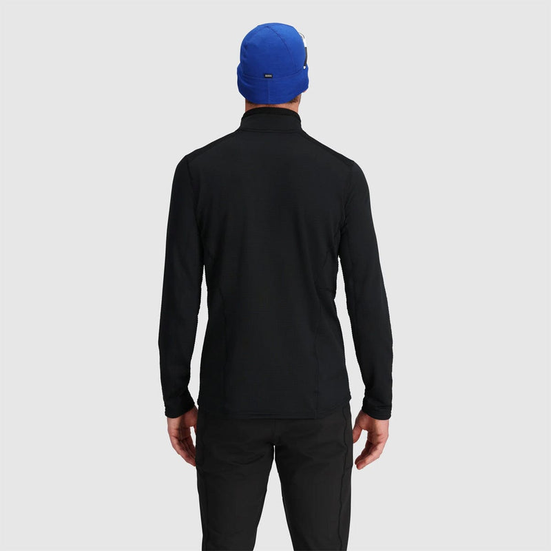 Load image into Gallery viewer, Person wearing a black long-sleeve shirt and blue beanie on a light gray background