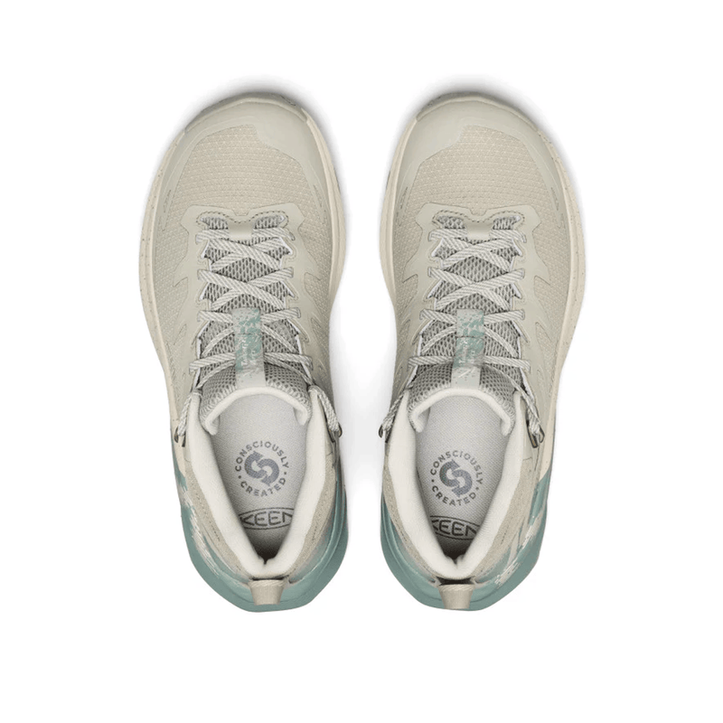 Load image into Gallery viewer, Pair of light gray sneakers with white soles on a white background