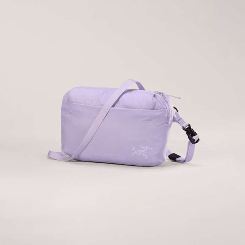 Load image into Gallery viewer, Purple crossbody bag with a visible brand logo on a light gray background