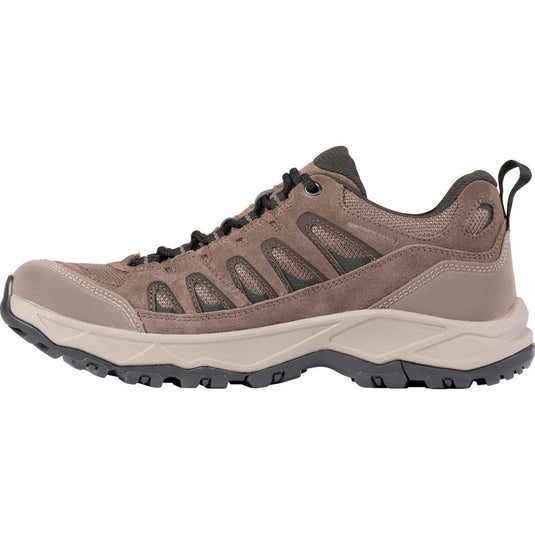 Brown hiking shoe with black accents on a white background