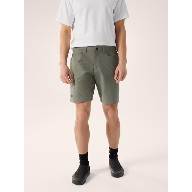 Load image into Gallery viewer, Person wearing olive green shorts on a white background