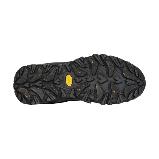 Black sole of a shoe with a yellow label on a white background