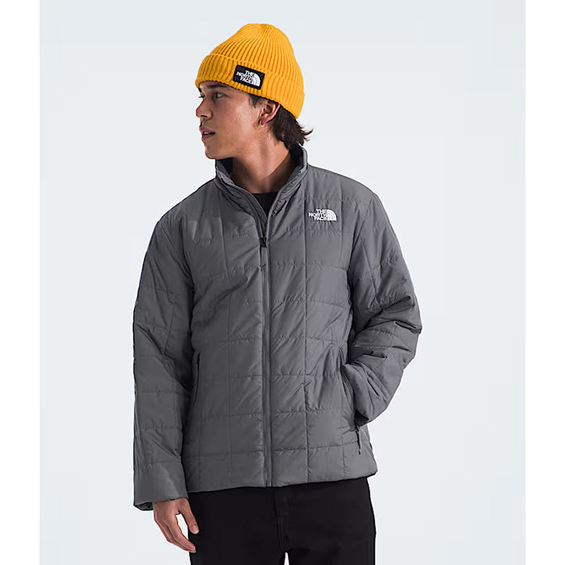 Load image into Gallery viewer, Person wearing a gray jacket and yellow beanie with a logo on a white background