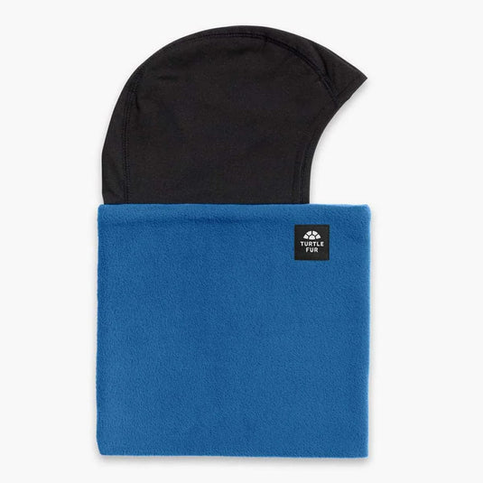 Blue neck gaiter with a black hood and Turtle Fur logo on a white background