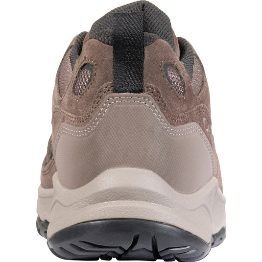 Brown hiking shoe with a white sole on a white background