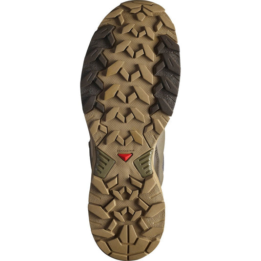 Close-up of a hiking shoe sole with brand logo on a white background