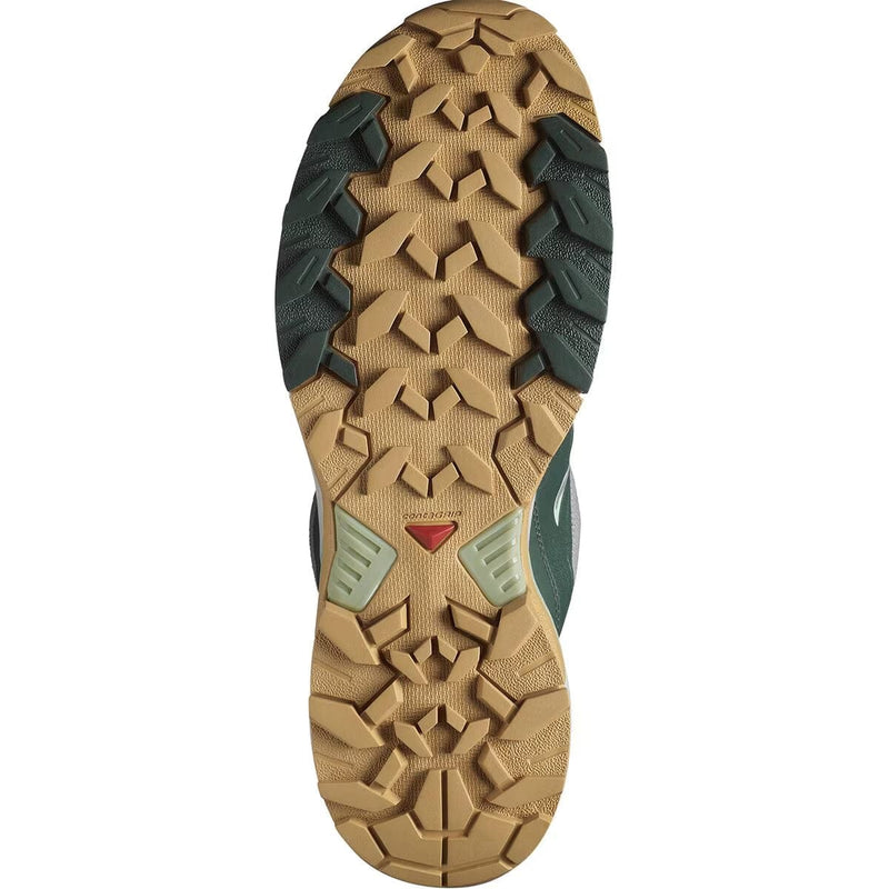Load image into Gallery viewer, Close-up of a hiking shoe sole with tread pattern on a white background
