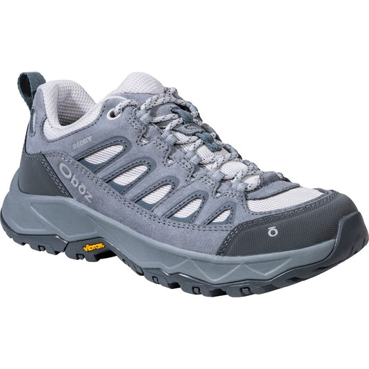 Gray hiking shoe with brand logo on a white background