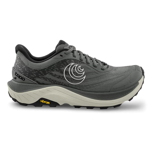 A green Topo Ultraventure 4 trail running shoe for men with orange detailing and a black sole.