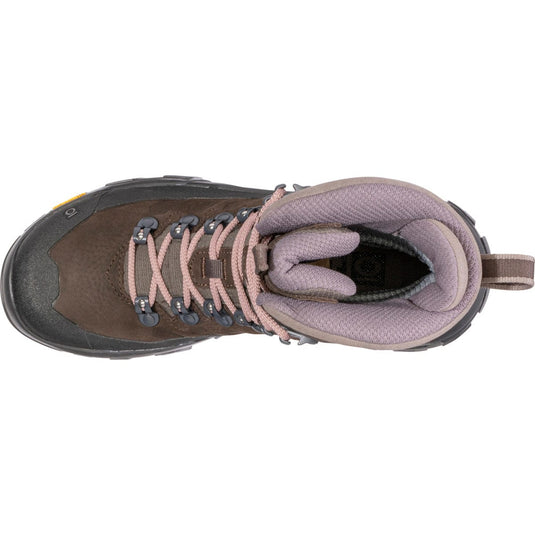 Brown hiking boot with pink laces on a white background