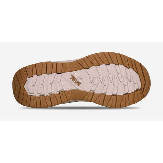 Brown sole of a shoe with visible brand logo on a white background