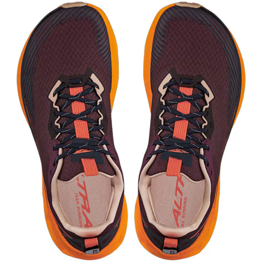 Pair of maroon and orange running shoes with visible brand logo on a white background
