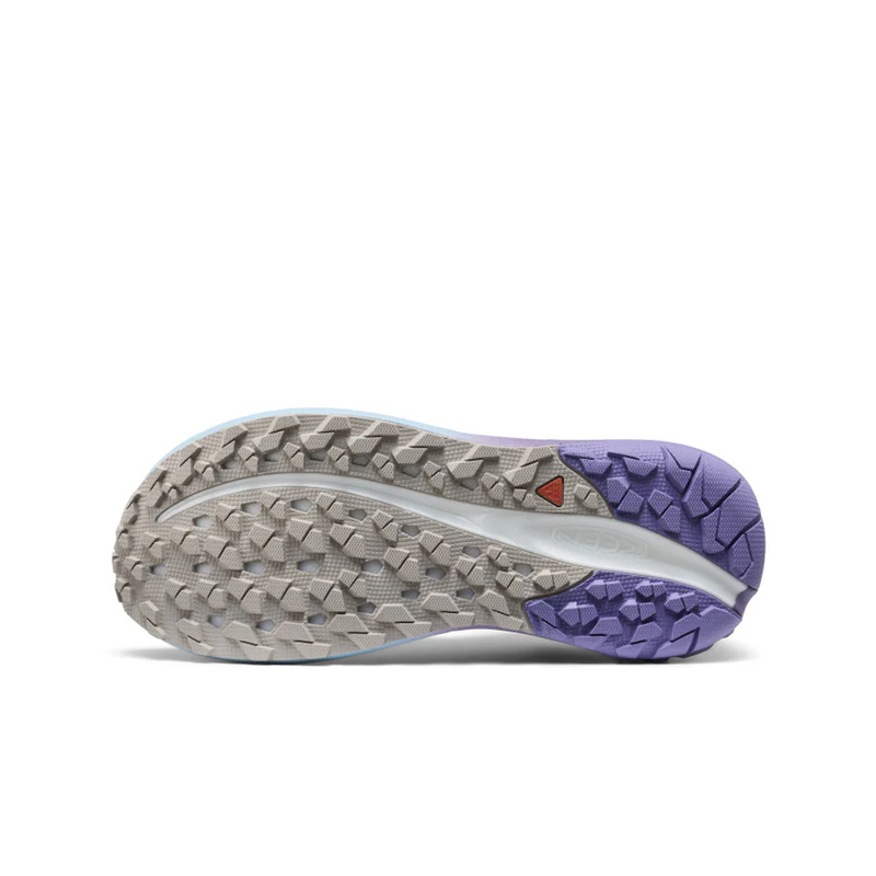 Load image into Gallery viewer, Close-up of a shoe sole with purple outsole and textured pattern on a white background