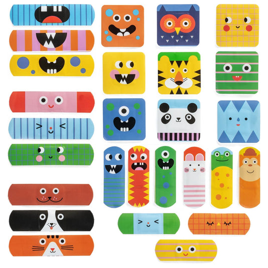 Collection of colorful band-aids with cartoon faces on a white background