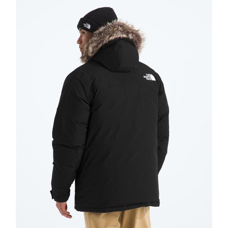 Load image into Gallery viewer, Person wearing a black jacket with fur hood on a white background