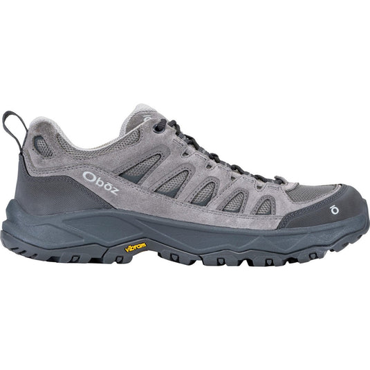 Gray hiking shoe with visible Oboz branding on a white background