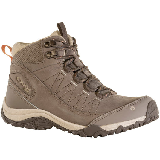 Brown hiking boot with brand logo on a white background