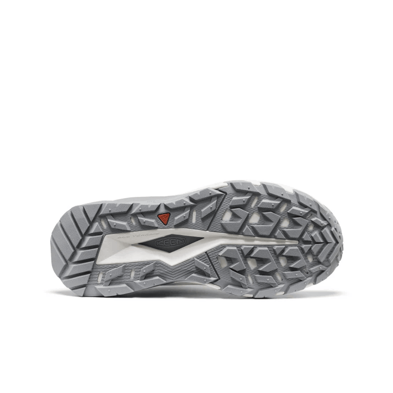 Load image into Gallery viewer, Close-up of a gray athletic shoe sole with tread pattern on a white background