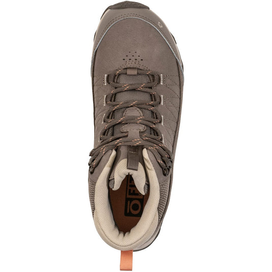 Brown hiking boot with visible brand logo on a white background