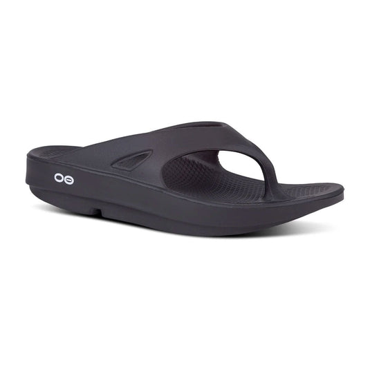 Black sandal with a brand logo on a white background