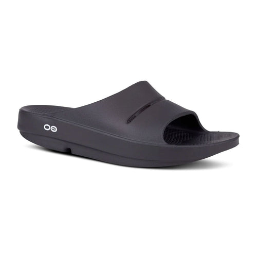 Black slide sandal with 'oo' logo on a white background