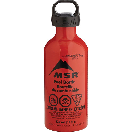 Red MSR fuel bottle with black cap on a white background