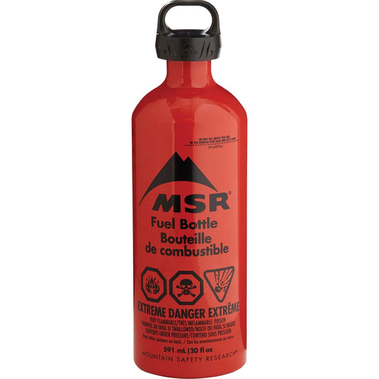 Red MSR fuel bottle with black cap on a white background