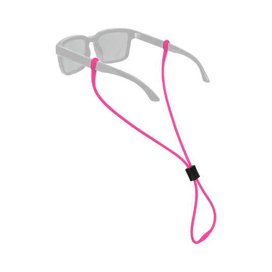A pair of light gray sunglasses with a bright pink adjustable neck strap and a small black slider, shown on a plain white background.
