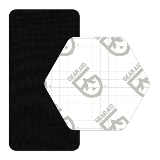 Black patch with a white hexagonal patch featuring 'Gear Aid' branding on a white background