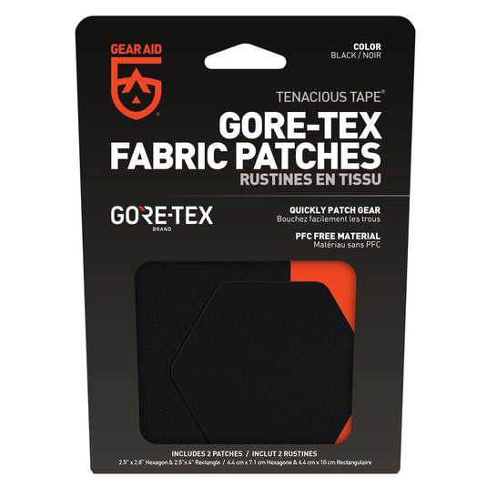 Packaging of Gore-Tex fabric patches with visible branding on a white background