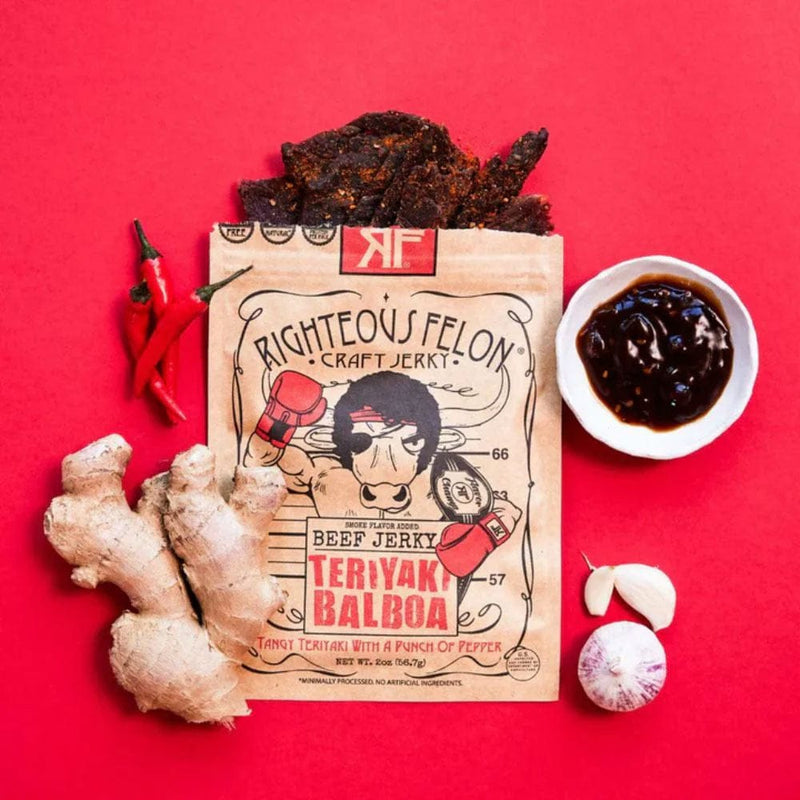 Load image into Gallery viewer, Righteous felon craft jerky package with teriyaki balboa flavor on a red background
