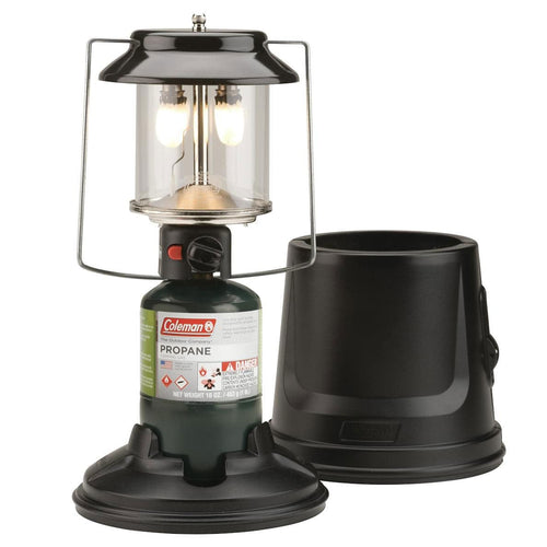 Coleman propane lantern with fuel canister on a white background