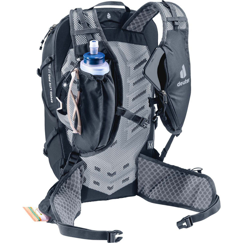 Load image into Gallery viewer, Gray and black hydration backpack with water bottle on a white background
