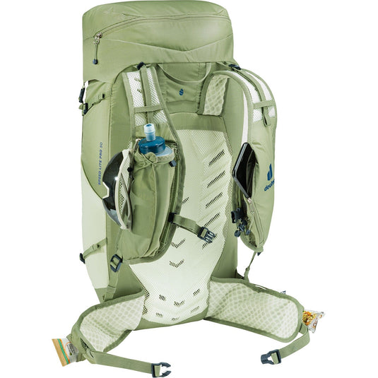 Green hiking backpack with water bottle holder on a white background