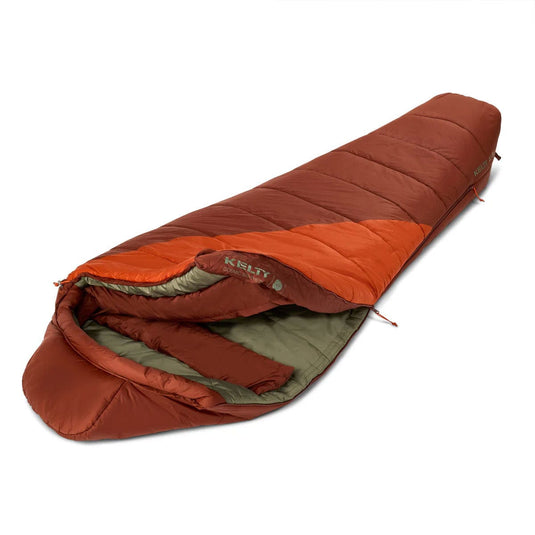 Brown and orange sleeping bag with Kelty branding on a white background