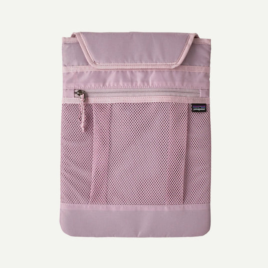 Pink mesh bag with zipper copartment on a white background