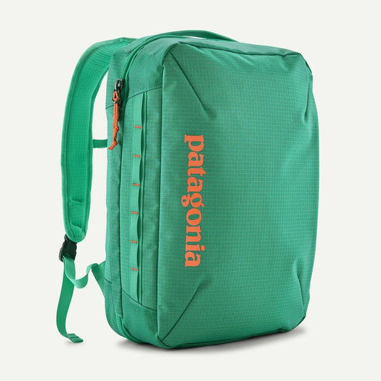 aqua-Green Patagonia backpack with orange logo on a white background