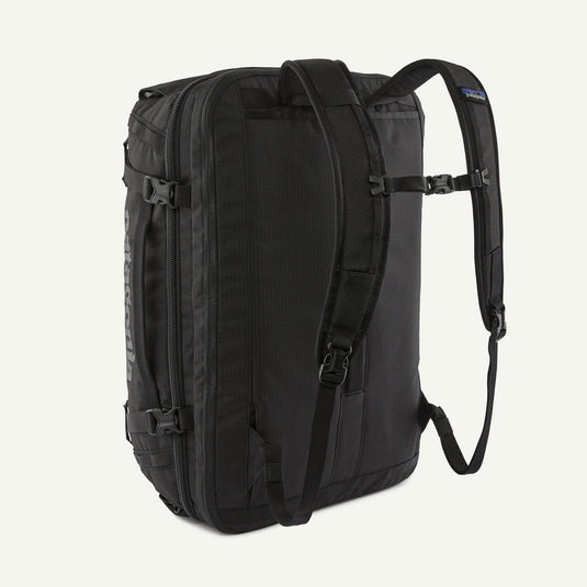 Black backpack on a light gray background