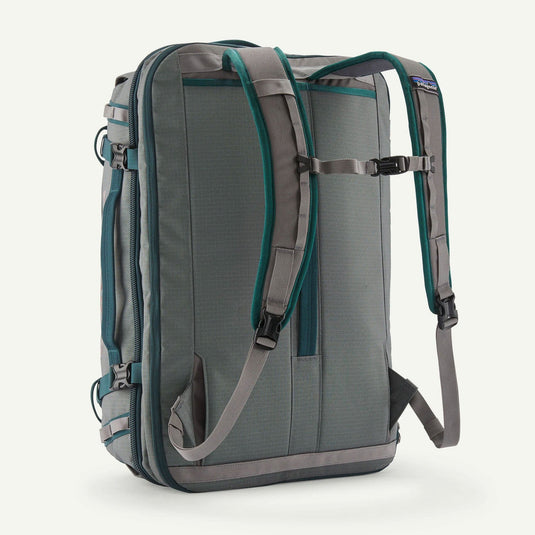 Gray and green backpack on a white background