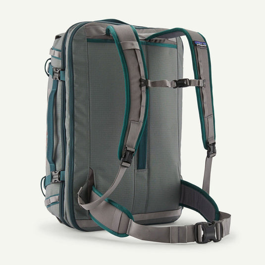 Gray and green backpack on a white background