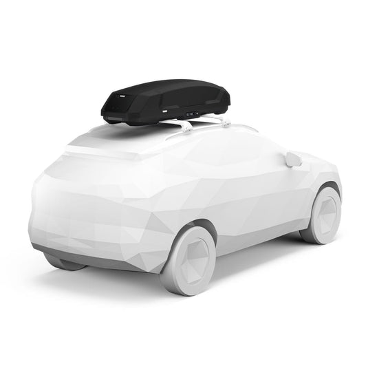 White car with a black roof box on a white background