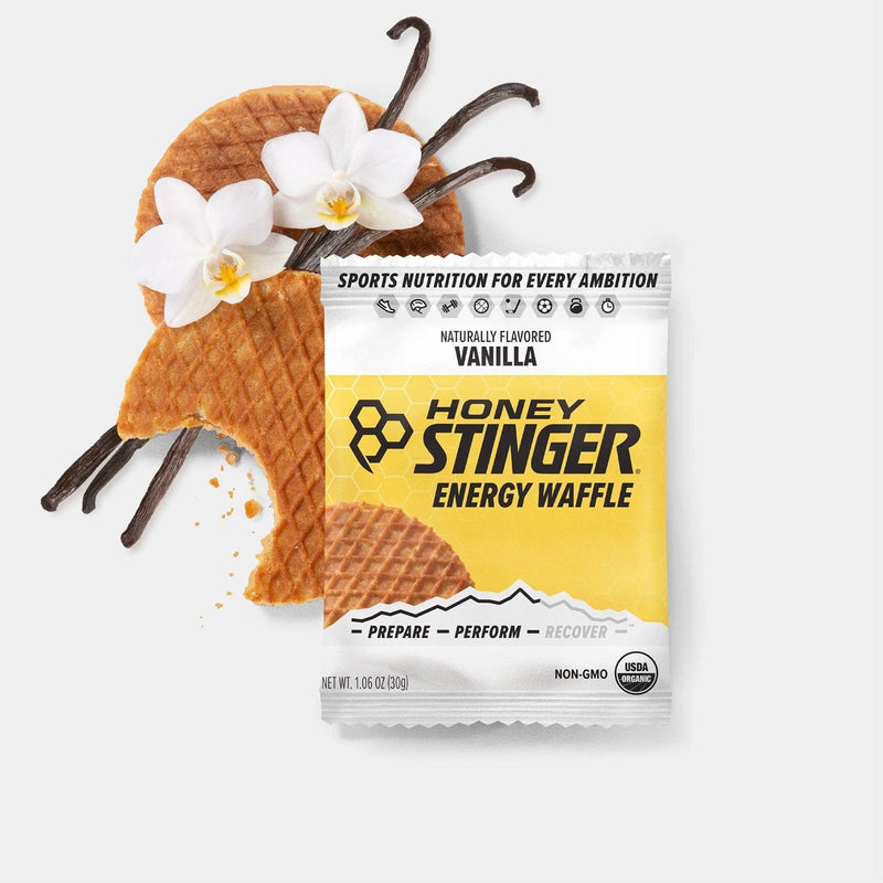 Load image into Gallery viewer, Honey Stinger vanilla energy waffle with packaging on a white background
