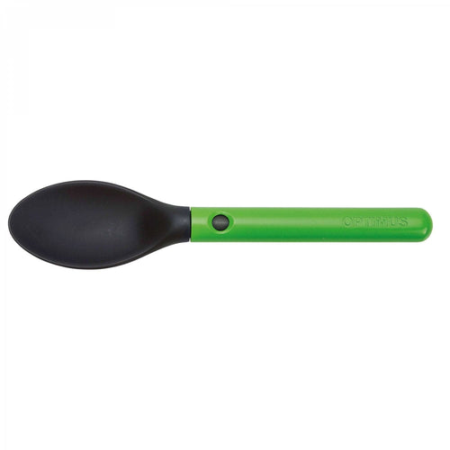 Black spoon with green handle on a white background