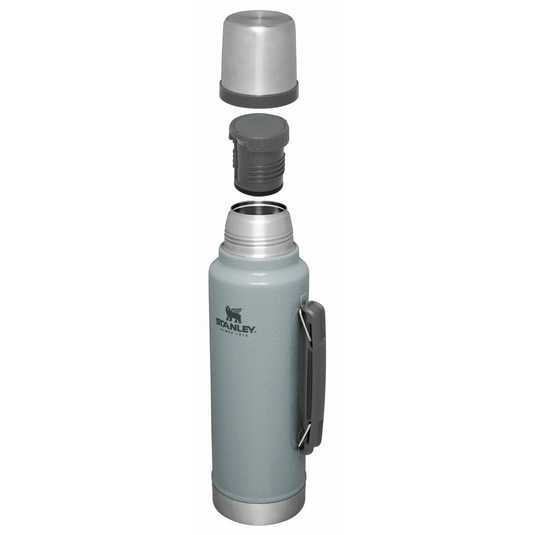 Gray Stanley vacuum bottle with two additional lids on a white background