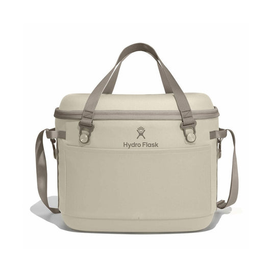 Beige cooler bag with shoulder straps on a white background, featuring the Hydro Flask logo.