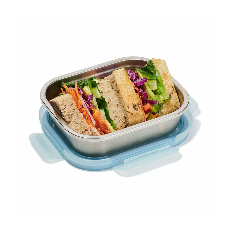 Load image into Gallery viewer, Vegetable sandwich in a metal lunch box with a blue lid on a white background
