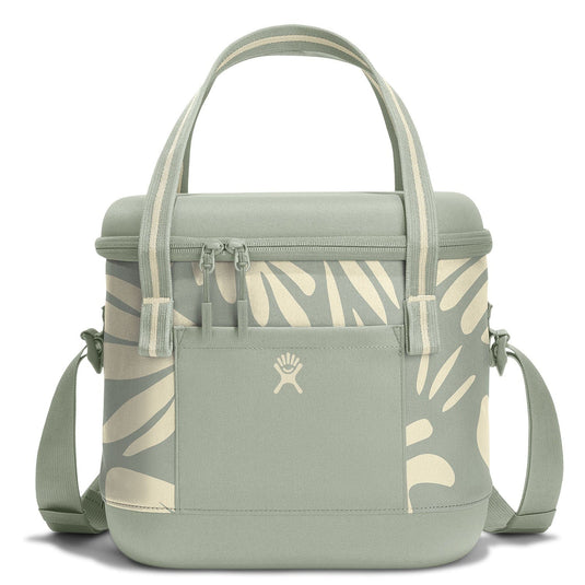Light green cooler bag with leaf pattern on a white background